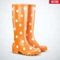 Pair of orange rain boots