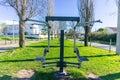 Pair of outdoor gym workout towers in urban park, inviting outdoor fitness. Royalty Free Stock Photo
