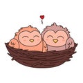 A pair of owls in love is sitting in a nest woven from twigs.