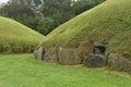 A pair of passage tombs in the neolithic tomb complex at Knowth in Ireland Royalty Free Stock Photo