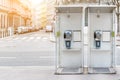 Pair of payphone booth in Vienna center street. Two modern public phones on european city street. copyspace