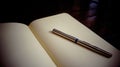 a pair of pens and a book on the table