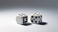 pair of perfectly balanced dice on a white background