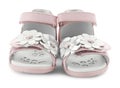 Pair of pink baby sandals decorated with flowers