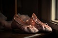 A pair of pink ballet shoes sit on a window sill, waiting for their owner to come and put them on so they can go dancing