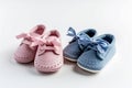 Pair of pink and blue baby shoes. Generative AI Royalty Free Stock Photo