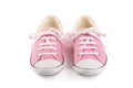 Pair of pink female sneakers isolated on white Royalty Free Stock Photo