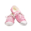 Pair of pink female sneakers isolated on white Royalty Free Stock Photo