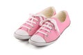 Pair of pink female sneakers isolated on white Royalty Free Stock Photo