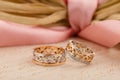 Pair of pink gold and white gold ring with floral pattern