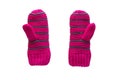 Pair of pink knitted winter mittens for children isolated on white background. Royalty Free Stock Photo