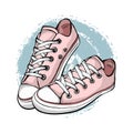 A pair of pink sneakers isolated on white background.