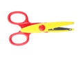 Pair of plastic scissors on white