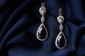 Pair of platinum earring with sapphire