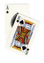 A pair of playing cards showing an ace and a king of spades.