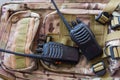 Pair of portable radio sets on the background of a military backpack camouflage modern army radio