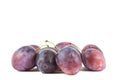 Pair of purple Plums with leaf isolated on white background Royalty Free Stock Photo