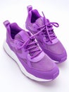 Pair of purple sneakers. Royalty Free Stock Photo