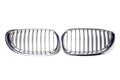 Pair radiator grilles on a white background made of shiny chromed metal is an element of the car body that protects and passes air