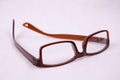 a pair of glasses with a brown translucent frame