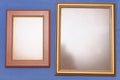 A pair of rectangular shaped photo frames with edges of different material. Royalty Free Stock Photo