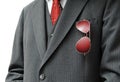 Pair of Red Aviators in Businessman's Pocket Royalty Free Stock Photo