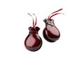 Pair of red castanets with ribbons on black background Royalty Free Stock Photo