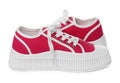 Pair of red classic old school sneakers on white background Royalty Free Stock Photo