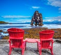 Pair of red deck chairs and Rock Hvitsercur