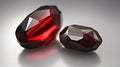 a pair of red diamonds sitting on top of a table