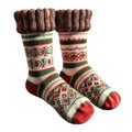 Pair of Red, Green, and White Knitted Socks with Folded Brown Tops Royalty Free Stock Photo