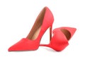 Pair of red high-heeled shoes isolated on white Royalty Free Stock Photo