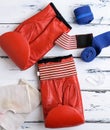 Pair of red leather boxing gloves, blue textile bandage Royalty Free Stock Photo