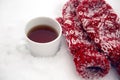 Pair of red mittens lie on the snow Royalty Free Stock Photo