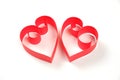 Pair of red paper hearts on white background isolated