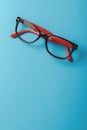 pair of red plastic-rimmed eyeglasses Royalty Free Stock Photo