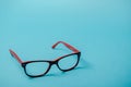 pair of red plastic-rimmed eyeglasses Royalty Free Stock Photo