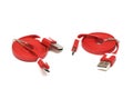 A pair of red Universal Serial Bus USB cable