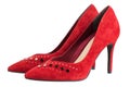 Pair of red women`s shoes on a white background. Suede shoes. File contains clipping path Royalty Free Stock Photo