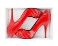 Pair of red women stiletto heel shoes in box