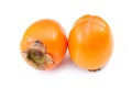 Pair of ripe persimmons isolated on white Royalty Free Stock Photo