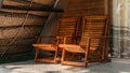 Pair of rocking chairs on cabana porch in the tropics morning close-up view. The best way to release tension, sit and relax while Royalty Free Stock Photo