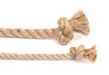 Pair of ropes are different diameters with knots isolated on a white