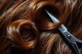 A pair of scissors sits atop a pile of hair, representing the essential tools used in haircutting, A close-up depiction of