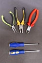 Pair of screwdrivers rubber handles parallel hand tools three pliers pliers set construction