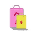 Pair of shopping bag with bell and candy stick icon