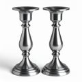 Pair of Silver Candlesticks in Studio Lighting on White Background Royalty Free Stock Photo