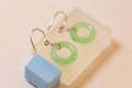 Pair of silver earring with circle jade closeup