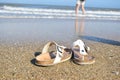 A pair of slippers on the beach Royalty Free Stock Photo