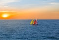 Pair of small sail yacht in sea at the evening